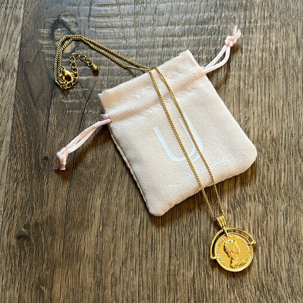 Uncommon James coin necklace